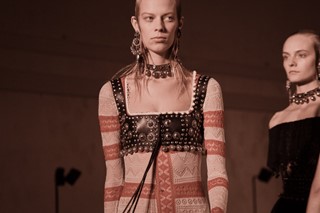 Does Gucci own Alexander McQueen?