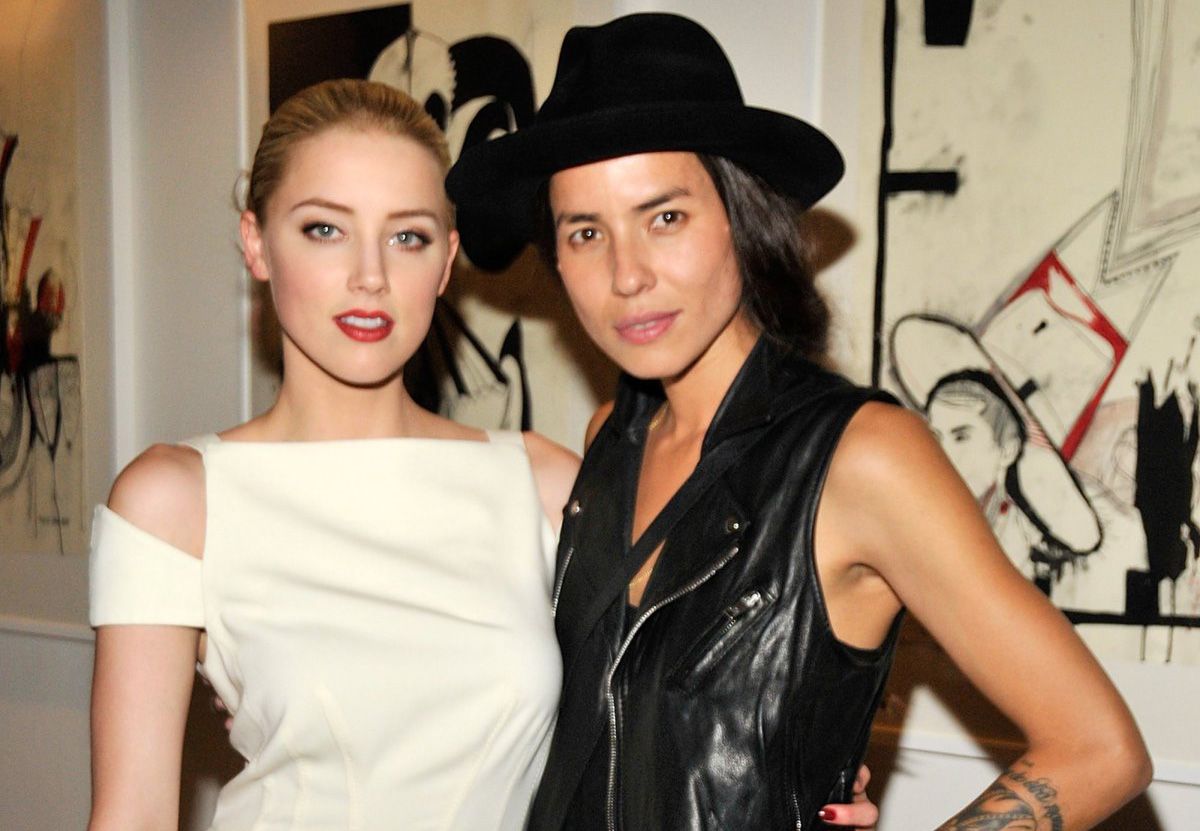 Is Amber Heard dating a woman?
