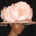 Which of these designers was well known for hats and millinery?