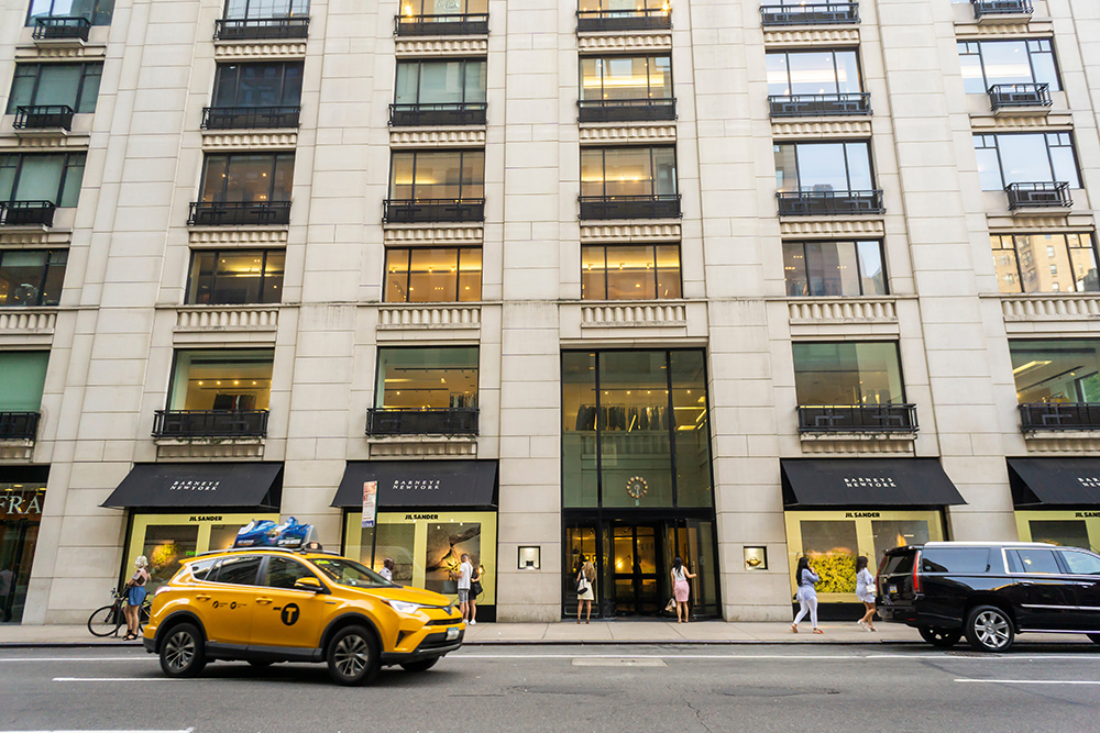 Who bought Barneys NYC?