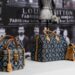 Who is the designer for Louis Vuitton 2021?