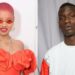 Who is the father of Slick Woods baby?
