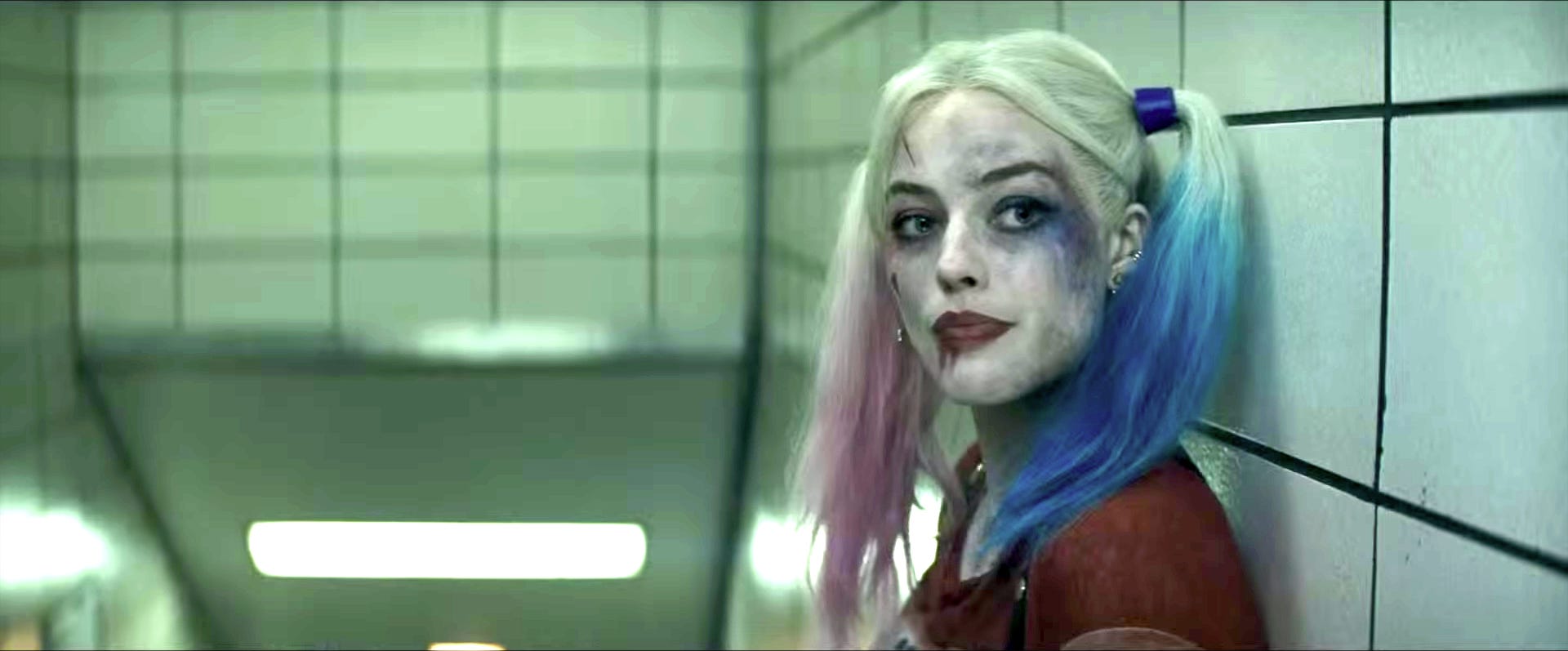 How does Margot Robbie feel about playing Harley Quinn?