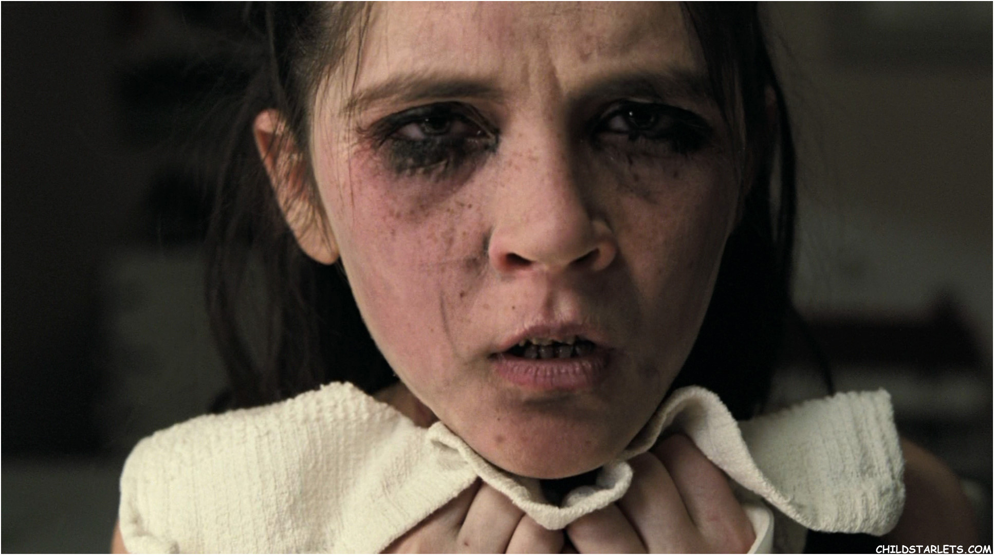 How old is the Orphan in the movie Orphan?