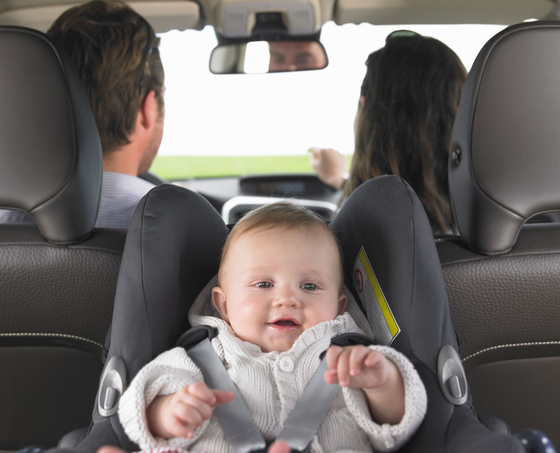 How should a newborn look in a car seat?