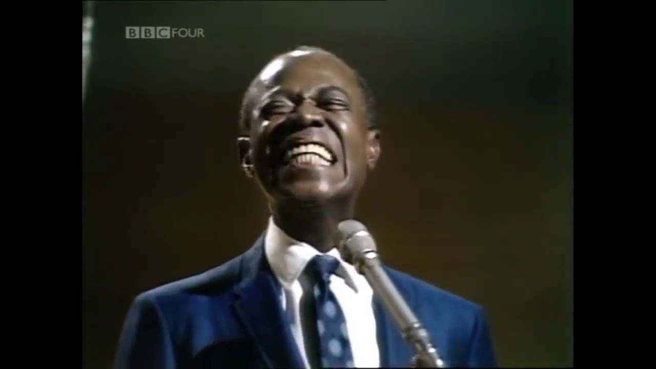 What movies is Louis Armstrong What a wonderful world in?