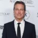 What nationality is John Corbett?