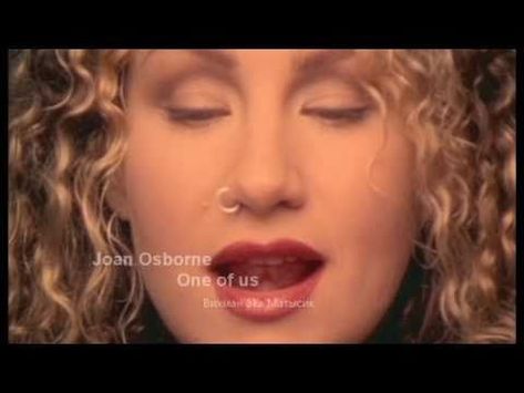 What piercing is Joan Osborne noted for having in the music video for One of Us?