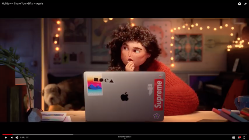 Who is singing Candyman in Apple commercial?