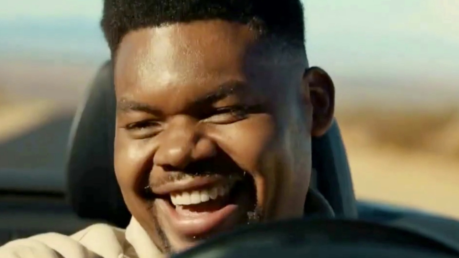 Who is the black guy driving the car in the Allstate commercial?