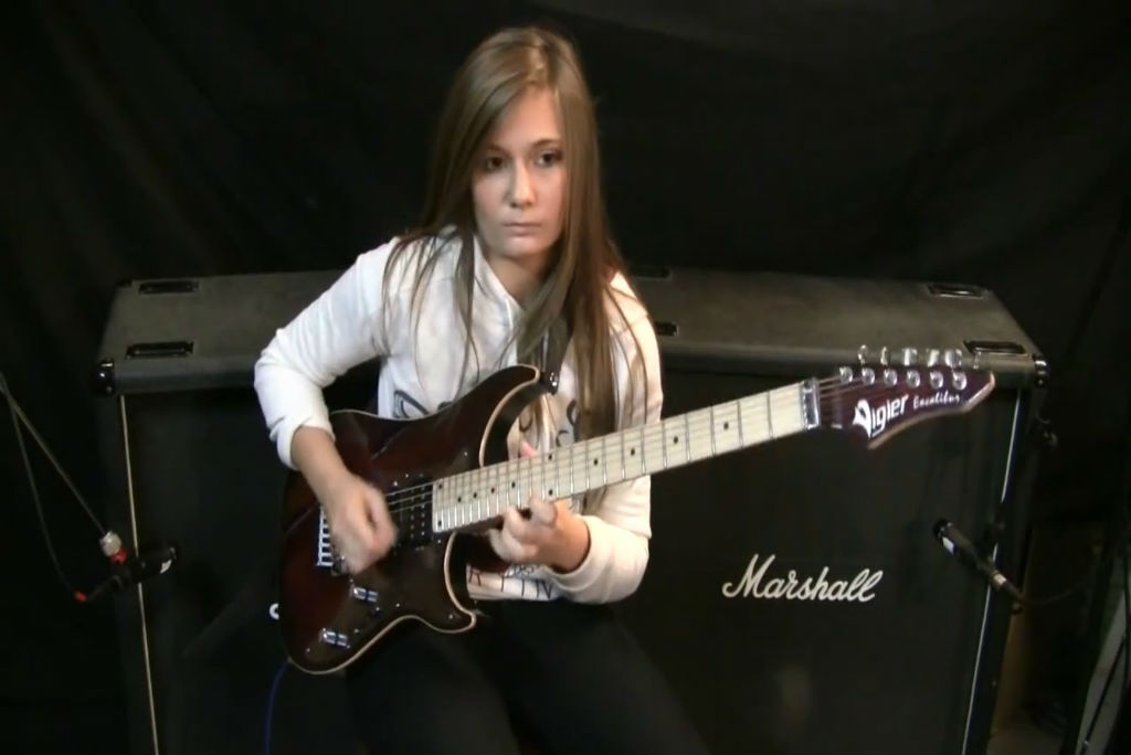 Who is the female guitar player in the Old Navy commercial?