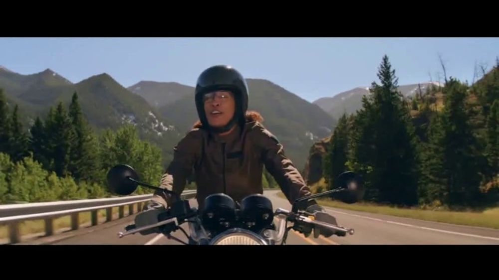 Who is the girl in the Geico commercial on the motorcycle?