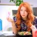 Who is the redhead woman in the LG commercial?