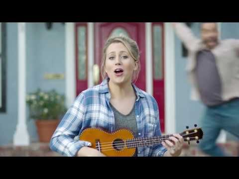 Who sings the song searching in the Verizon commercial?