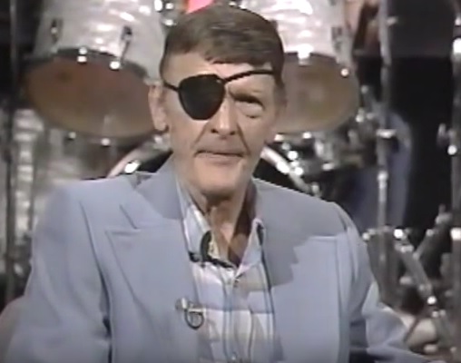 Why did Bobby Helms wear an eye patch?