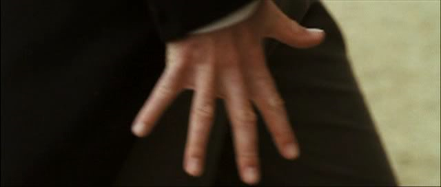 Why did Mr Darcy flex his hand?